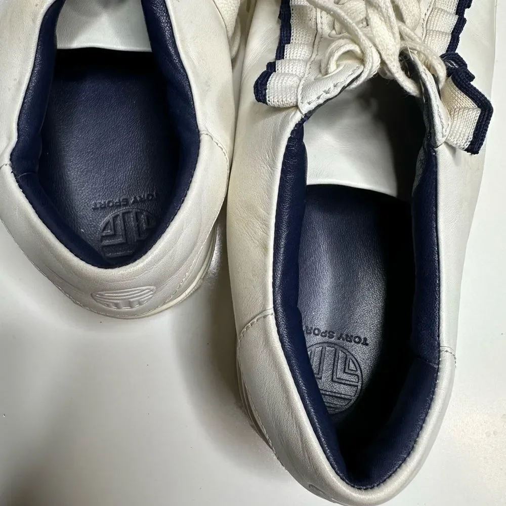 Tory Burch Ruffle sneakers. Size 10M. White with elegant‎ black ruffle.